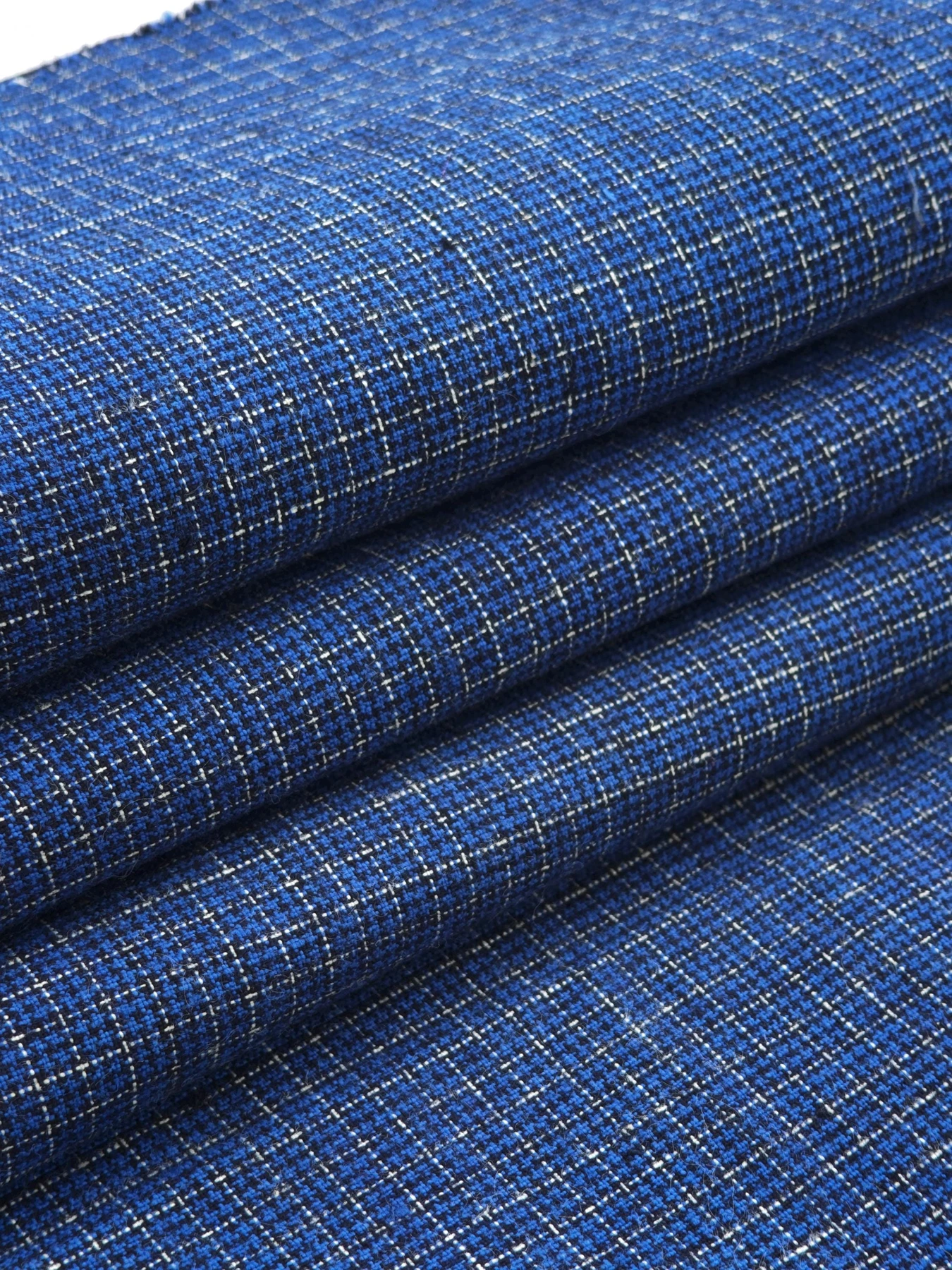 Indigo Osmanthus Grid — source photograph 3, documenting the same textile.