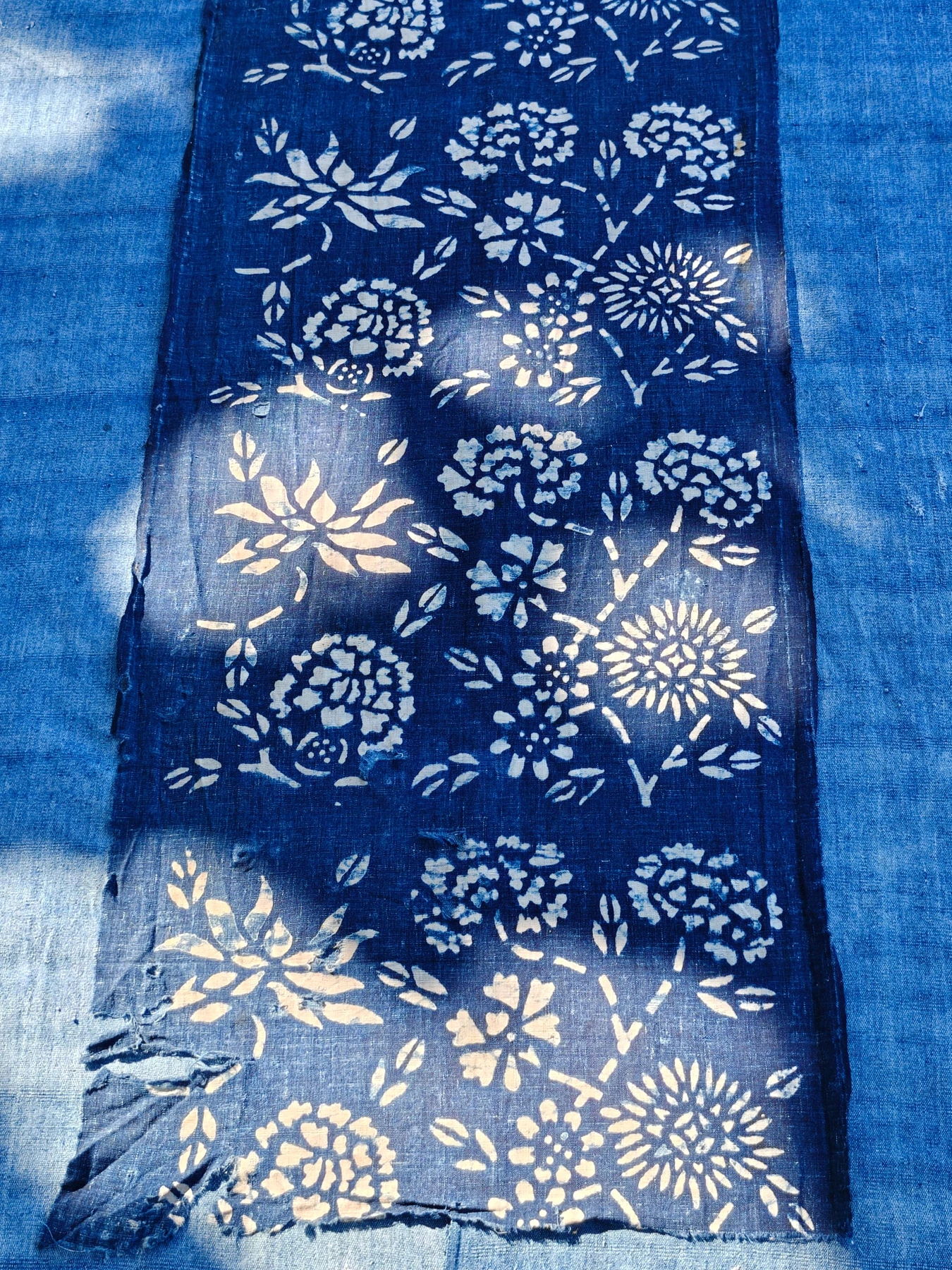 Indigo Floral Resist Textile — source photograph 2, documenting the same textile.